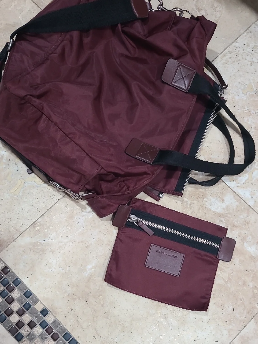 Marc Jacobs Baby Diaper Bag in Burgundy. It does not come With Changing Pad.